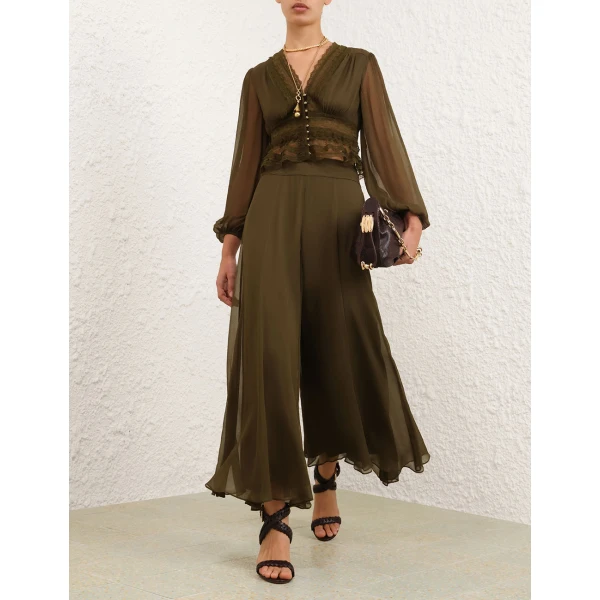 Elevate your elegance in this Zimmermann Tops   from the 2025 resort wear edit