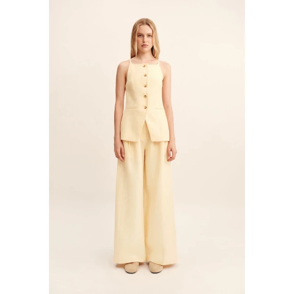 Posse Parker Trouser - Dusty Citron – sustainable Pants in Yellow from Australian designer at Coveti.