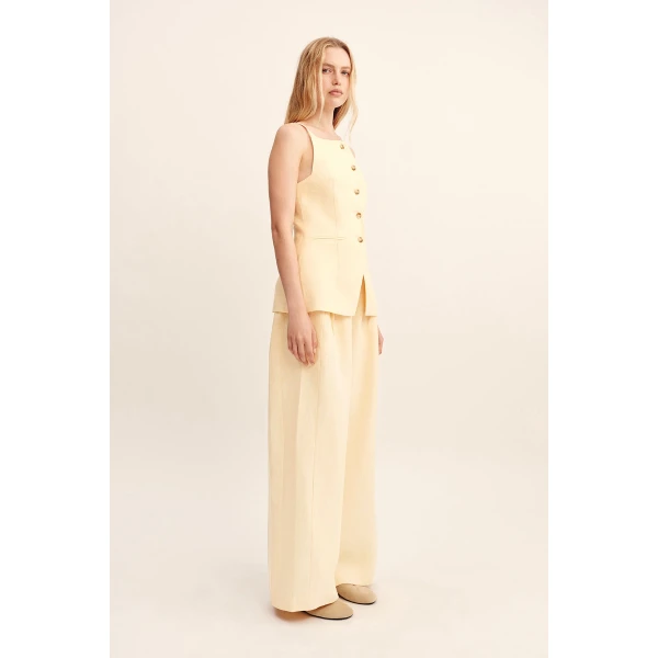 Posse Parker Trouser - Dusty Citron – sustainable Pants in Yellow from Australian designer at Coveti.