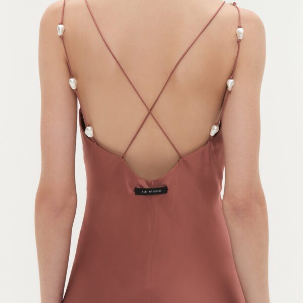Aje Aus  – structured silhouette with raw femininity from Coveti