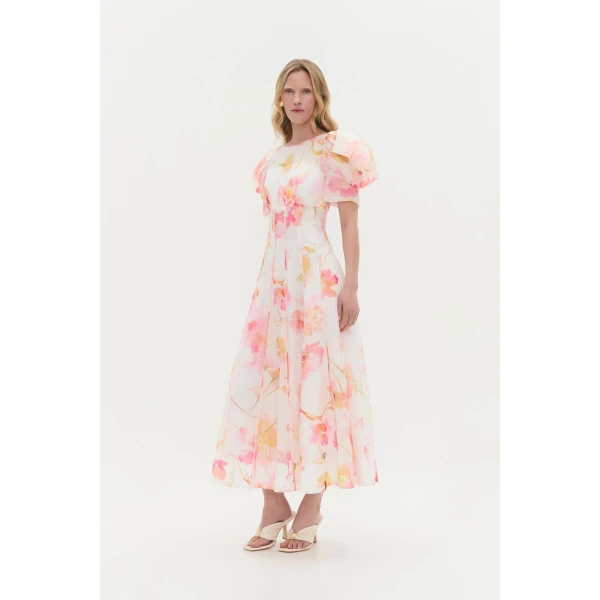 Aje Aus Dresses – structured silhouette with raw femininity from Coveti