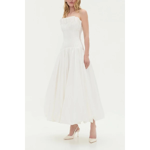Aje Aus Dresses – structured silhouette with raw femininity from Coveti
