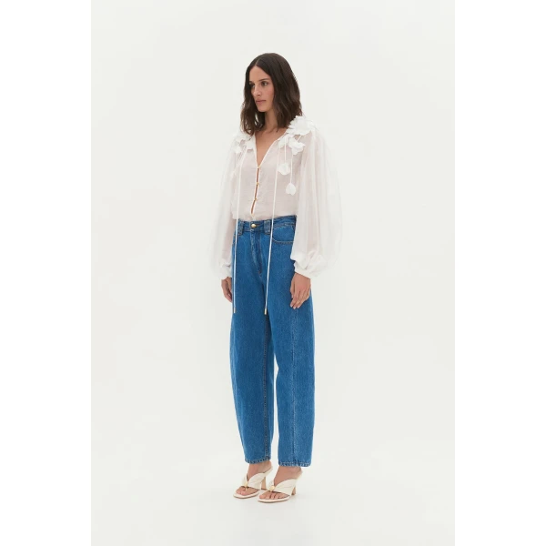 Aje Aus Tops – structured silhouette with raw femininity from Coveti