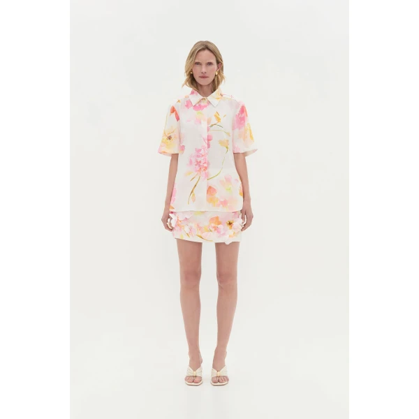 Aje Aus Tops – structured silhouette with raw femininity from Coveti