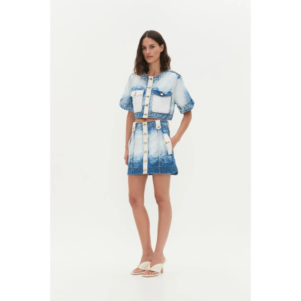 Aje Aus Tops – structured silhouette with raw femininity from Coveti