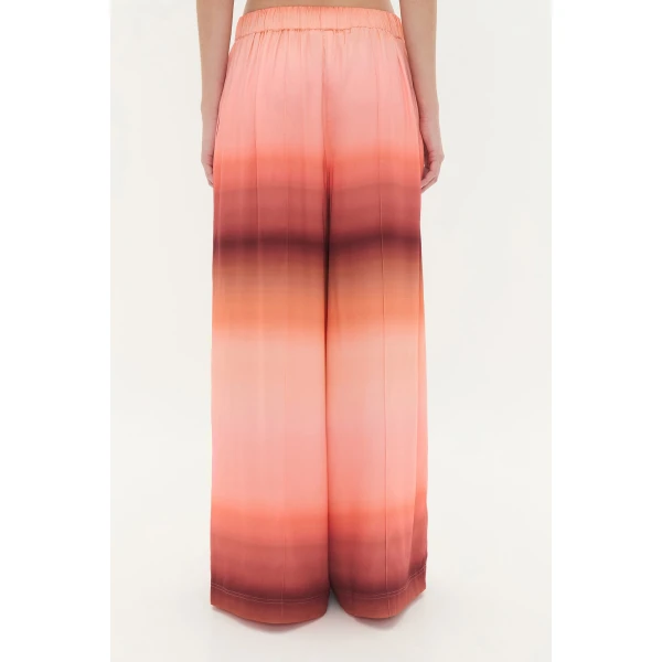 Aje Aus  – structured silhouette with raw femininity from Coveti
