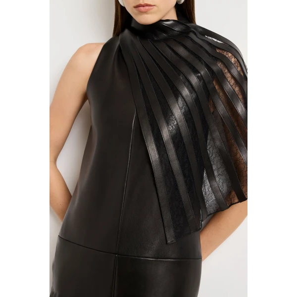 Brandon Maxwell Black Dresses with sculptural silhouette photographed against minimal backdrop