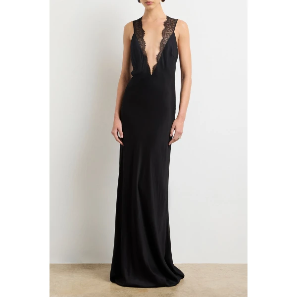 Brandon Maxwell Black Dresses with sculptural silhouette photographed against minimal backdrop
