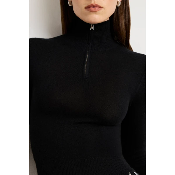 Brandon Maxwell Black Knitwear with sculptural silhouette photographed against minimal backdrop