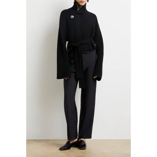 Brandon Maxwell Black Knitwear with sculptural silhouette photographed against minimal backdrop