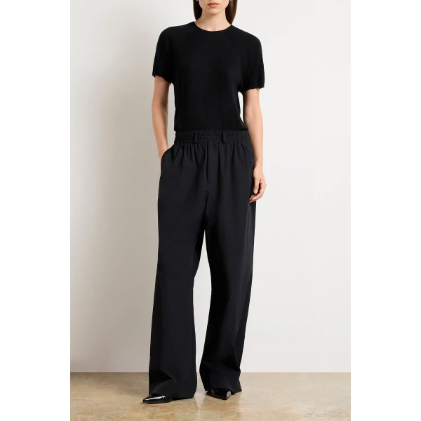 Brandon Maxwell Black Pants with sculptural silhouette photographed against minimal backdrop