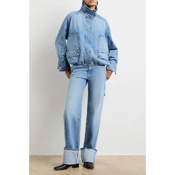 Brandon Maxwell Blue Jackets with sculptural silhouette photographed against minimal backdrop