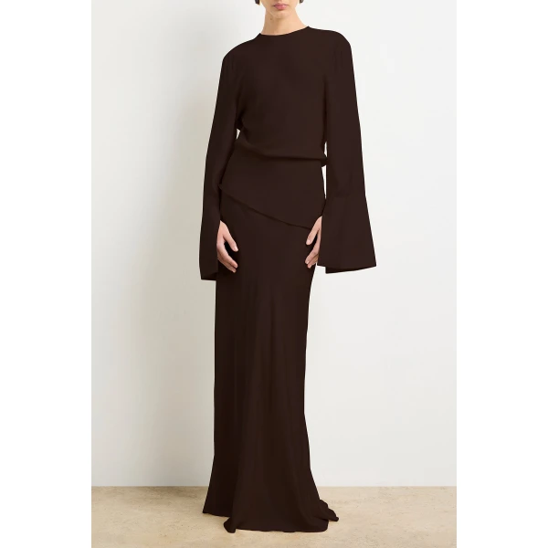 Brandon Maxwell red evening dress styled with sleek accessories