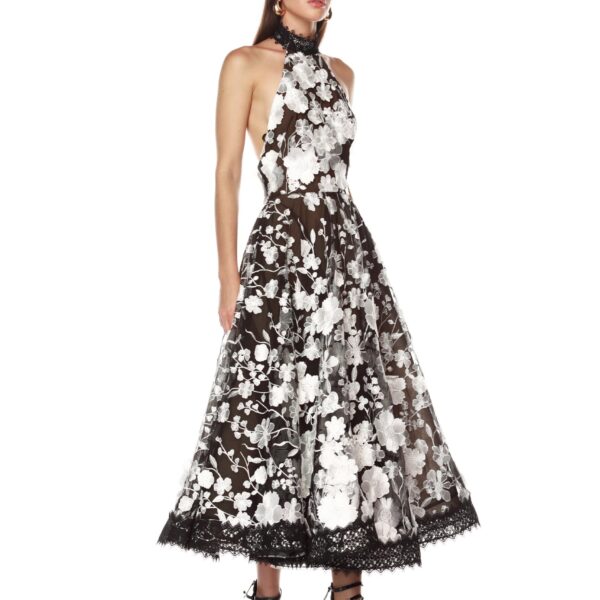 Bronx and Banco Black Greta Bouquet Black and White Midi Dress  a harmonious blend of structured elegance and timeless sophistication.