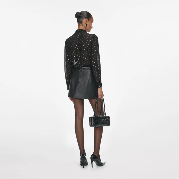 Elevate your elegance in this Self Portrait Tops  from the 2025 resort wear edit