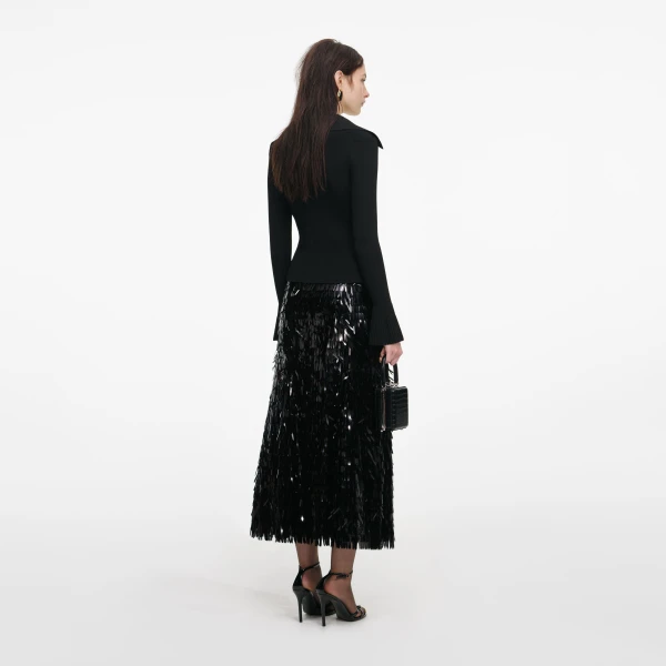 Elevate your elegance in this Self Portrait Tops  from the 2025 resort wear edit