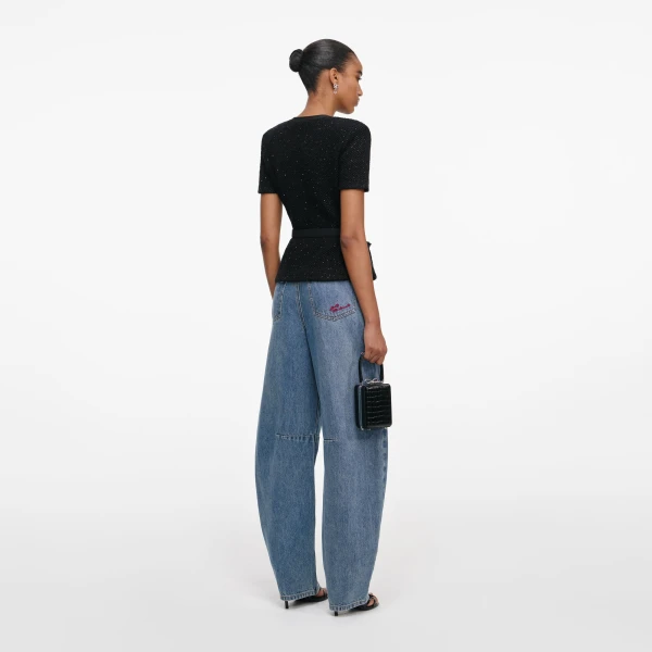 Elevate your elegance in this Self Portrait Tops  from the 2025 resort wear edit