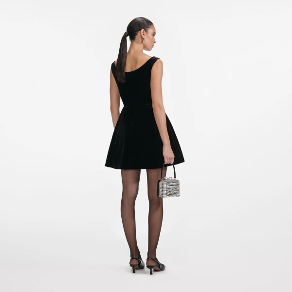 Elevate your elegance in this Self Portrait Dresses Mini Dress from the 2025 resort wear edit
