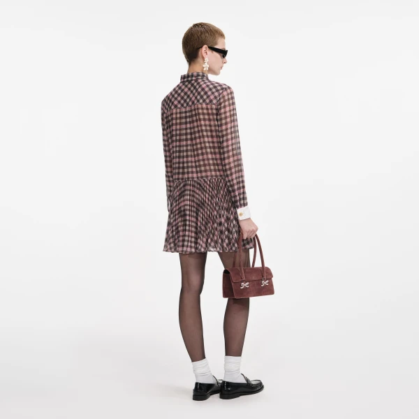 Elevate your elegance in this Self Portrait Dresses Mini Dress from the 2025 resort wear edit