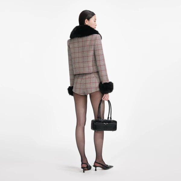Elevate your elegance in this Self Portrait Shorts  from the 2025 resort wear edit