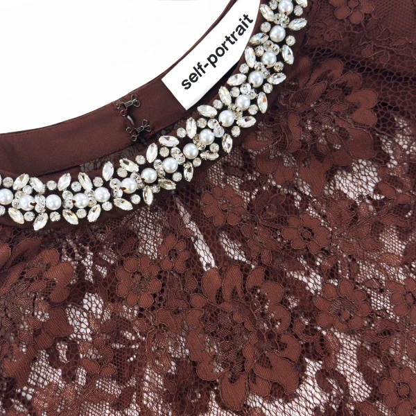 Elevate your elegance in this Self Portrait Tops  from the 2025 resort wear edit