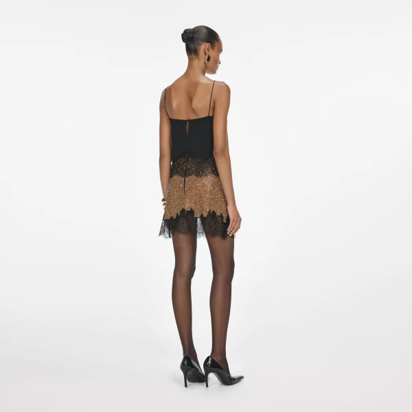 Elevate your elegance in this Self Portrait Tops  from the 2025 resort wear edit