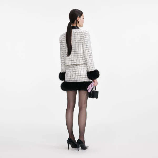 Elevate your elegance in this Self Portrait Jackets  from the 2025 resort wear edit