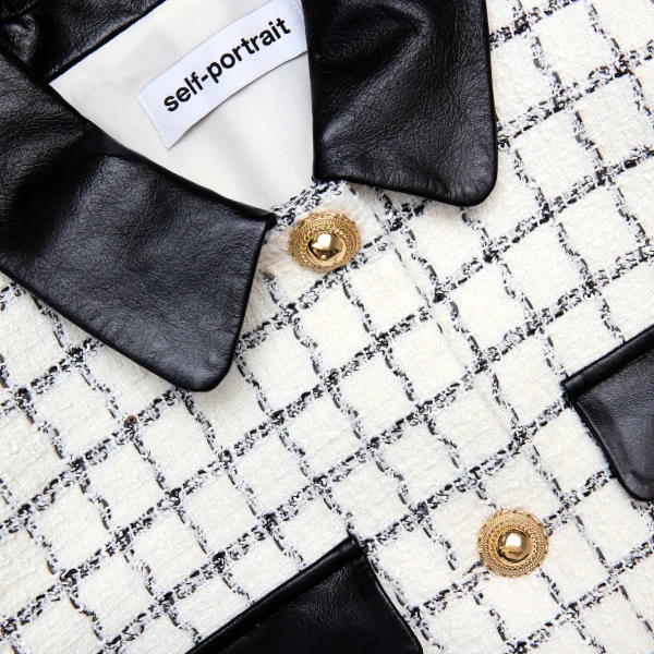 Elevate your elegance in this Self Portrait Jackets  from the 2025 resort wear edit