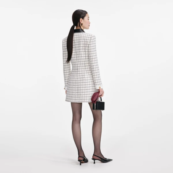 Elevate your elegance in this Self Portrait Dresses Mini Dress from the 2025 resort wear edit