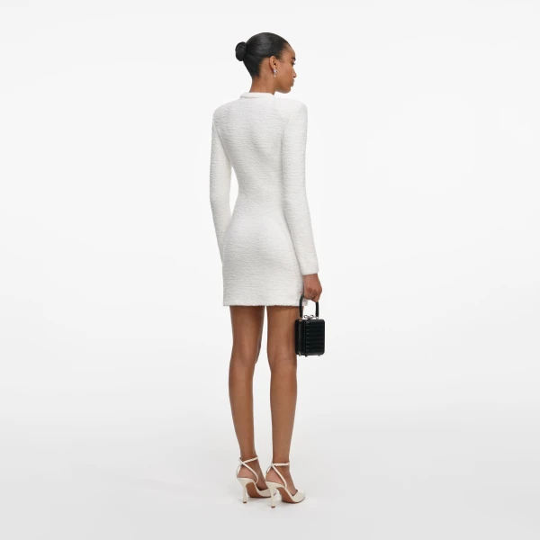 Elevate your elegance in this Self Portrait Dresses Mini Dress from the 2025 resort wear edit