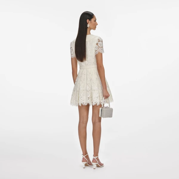 Elevate your elegance in this Self Portrait Dresses Mini Dress from the 2025 resort wear edit