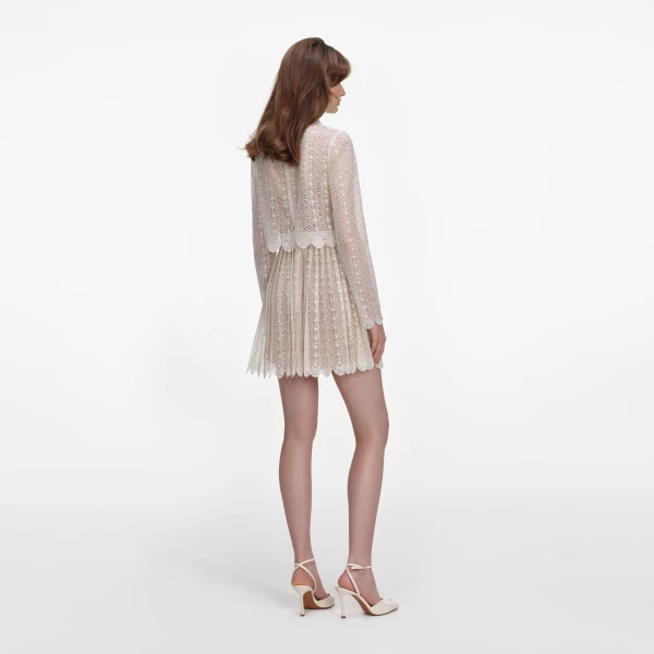 Elevate your elegance in this Self Portrait Dresses Mini Dress from the 2025 resort wear edit