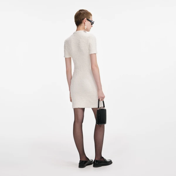 Elevate your elegance in this Self Portrait Dresses Mini Dress from the 2025 resort wear edit