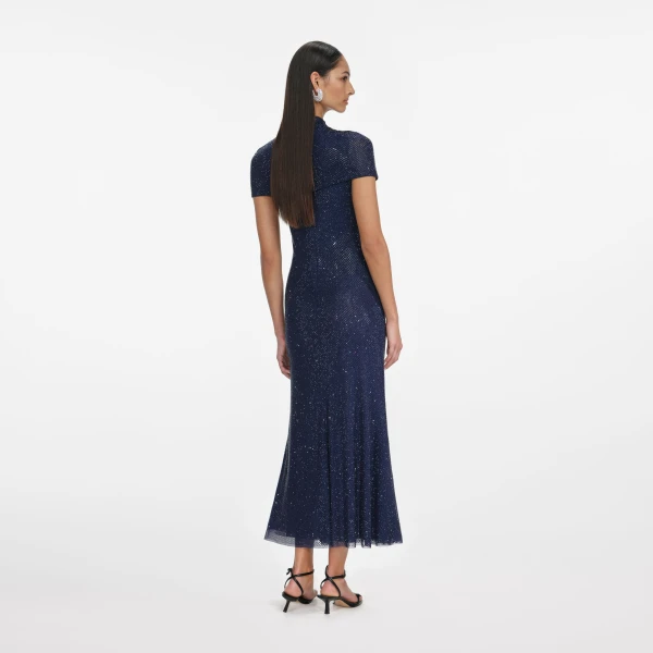 Elevate your elegance in this Self Portrait Dresses Midi Dress from the 2025 resort wear edit