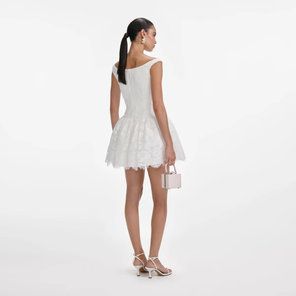 Elevate your elegance in this Self Portrait Dresses Mini Dress from the 2025 resort wear edit