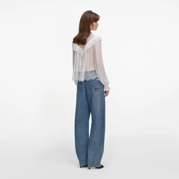 Elevate your elegance in this Self Portrait Tops  from the 2025 resort wear edit