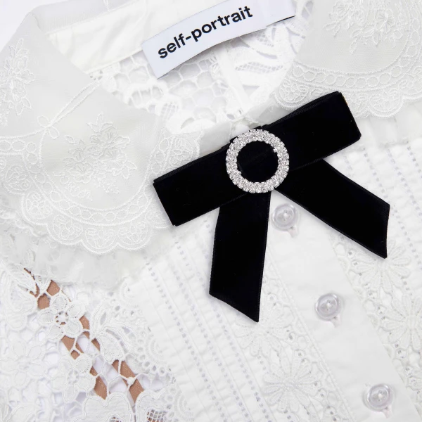 Elevate your elegance in this Self Portrait Tops  from the 2025 resort wear edit