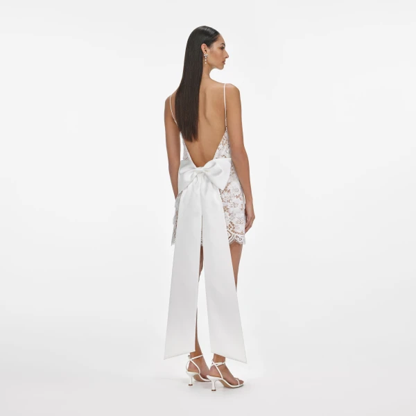 Elevate your elegance in this Self Portrait Dresses Mini Dress from the 2025 resort wear edit