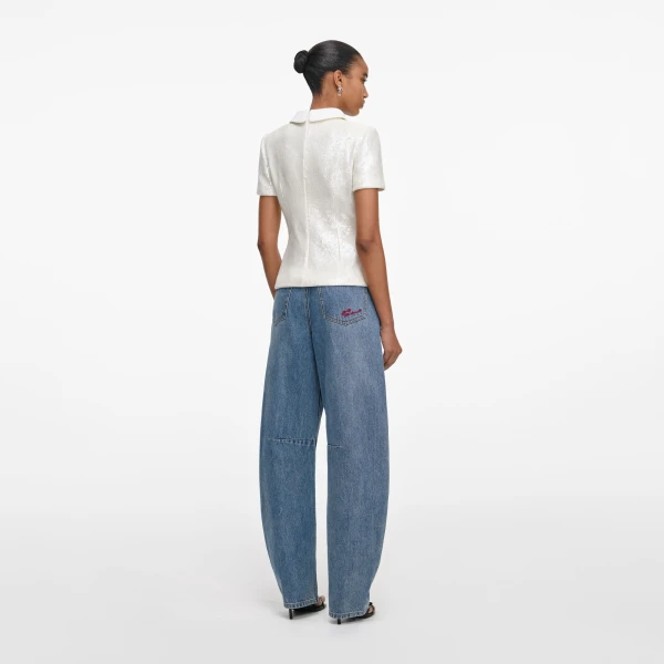 Elevate your elegance in this Self Portrait Tops  from the 2025 resort wear edit