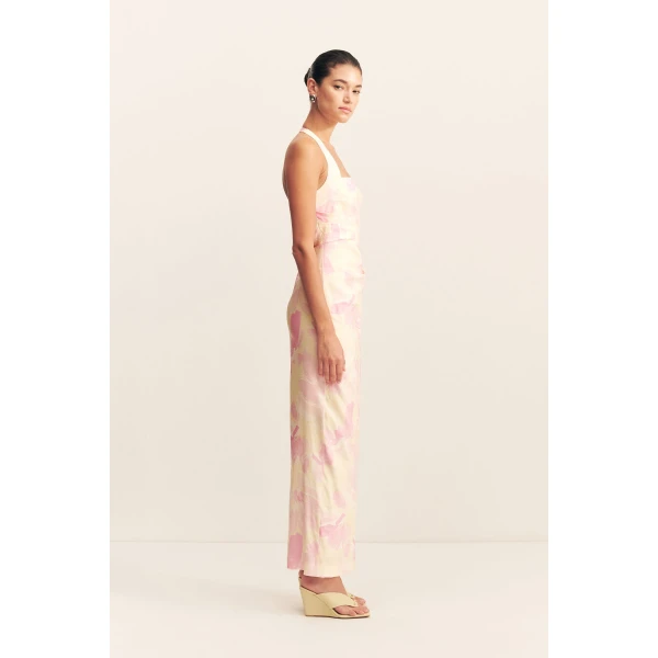 Draped halter maxi dress in the blush daylily print in a premium stretch linen blend.