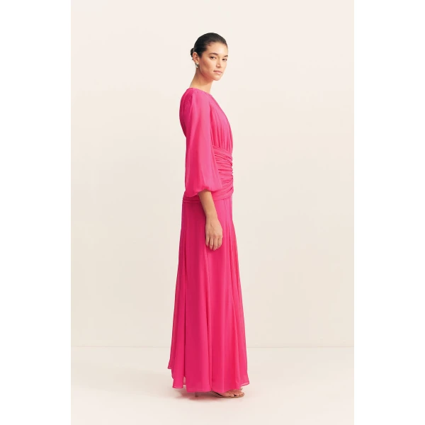 High neck balloon sleeve maxi dress in fuchsia in a semi-sheer georgette.