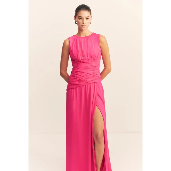 Side split maxi dress in fuchsia in a semi-sheer georgette.