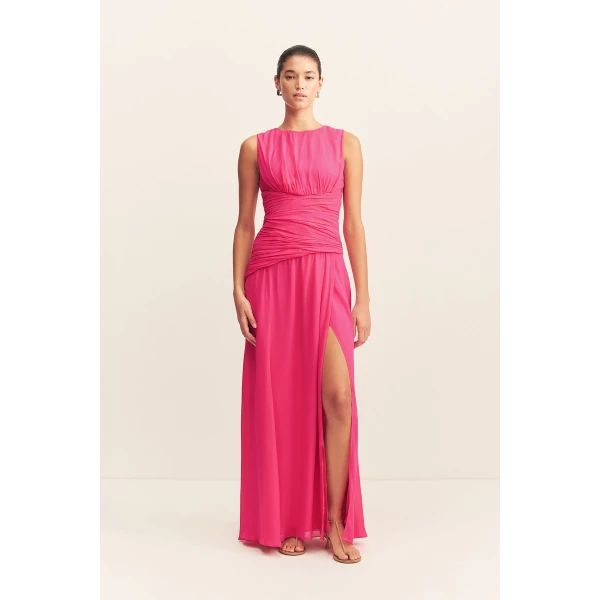 Side split maxi dress in fuchsia in a semi-sheer georgette.