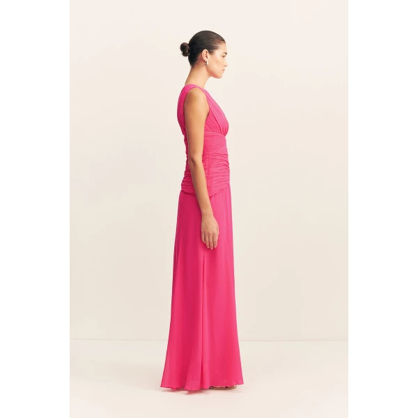 Side split maxi dress in fuchsia in a semi-sheer georgette.