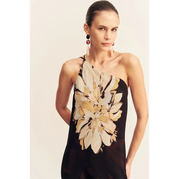 Asymmetrical maxi dress with cowl back detail in the natura floral print in a semi-sheer georgette.