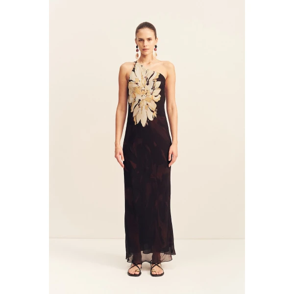Asymmetrical maxi dress with cowl back detail in the natura floral print in a semi-sheer georgette.
