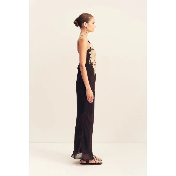 Asymmetrical maxi dress with cowl back detail in the natura floral print in a semi-sheer georgette.