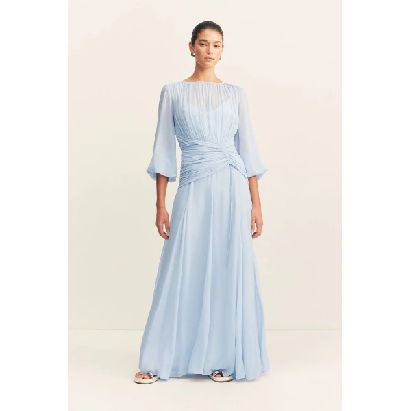 High neck balloon sleeve maxi dress in fuchsia in a semi-sheer georgette.