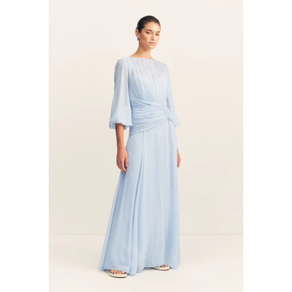 High neck balloon sleeve maxi dress in fuchsia in a semi-sheer georgette.