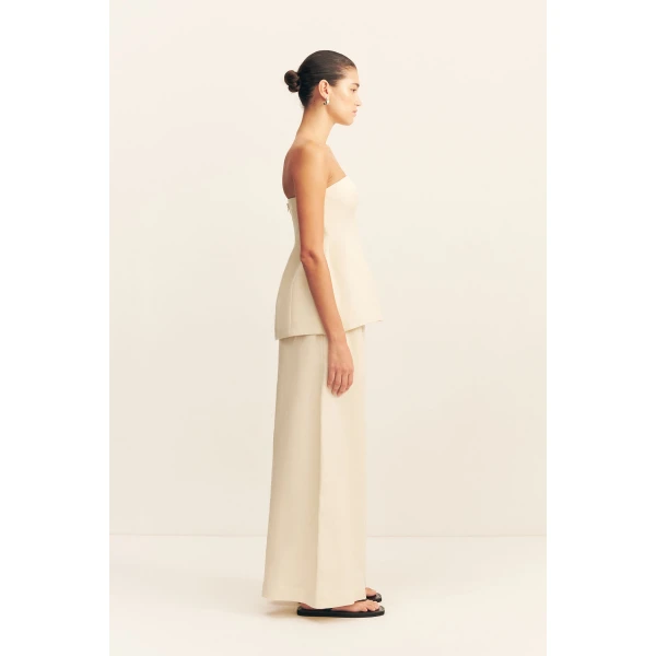 Strapless hourglass bustier in a premium linen blend in ecru.